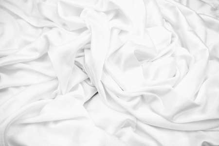 abstract background of white cloth for background use, template,art, abstract soft white fabric texture with curve and wave pattern for background ,wavy fabric,Soft,の写真素材