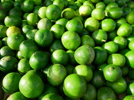 Pile of fresh lime background texture
