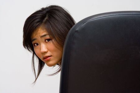 Beautiful Oriental woman with looking surprisedの写真素材