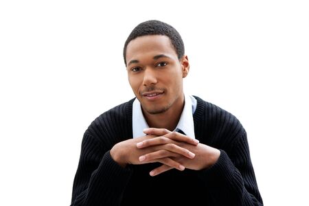 Handsome African American male in blue shirt and black sweater, isolatedの写真素材