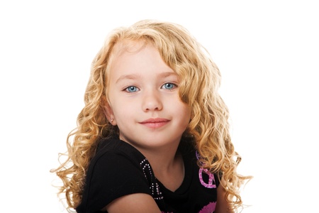 Beautiful happy smiling face of a young girl with golden blond hair and blue eyes, isolated.の写真素材