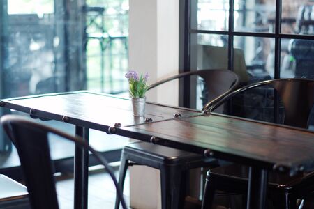 Artificial flowers on the table in the coffee shopの写真素材