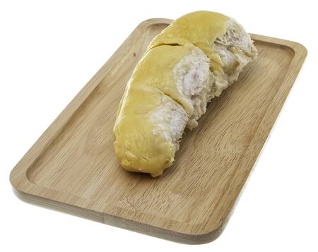 Durian on wooden plates and white backgroundの写真素材