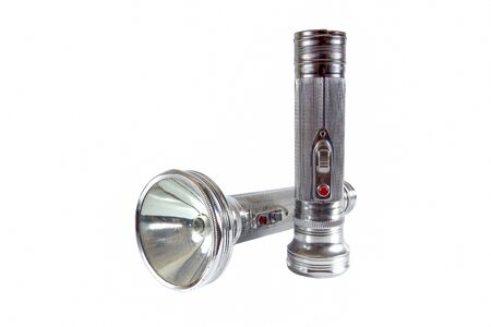 Two Old metal flashlight isolated on white backgroundの写真素材