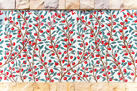 Traditional Turkish ceramic tile texture with stone frame wall