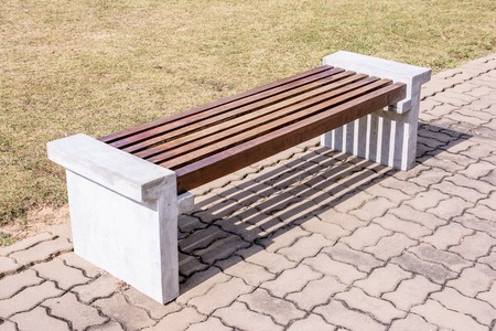 Wooden park bench at a parkの写真素材