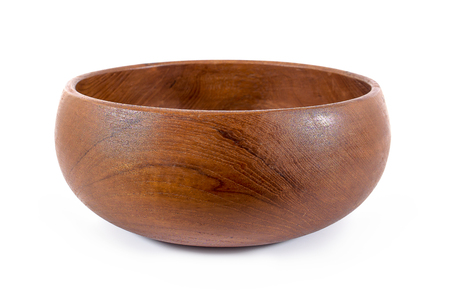 Round Wooden bowl isolated on white backgroundの写真素材