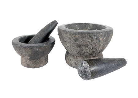 Mortar and pestle isolated on white background.Rock mortar.Stone mortar