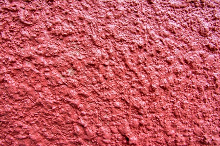 Rough concrete painted red color backgroundの写真素材