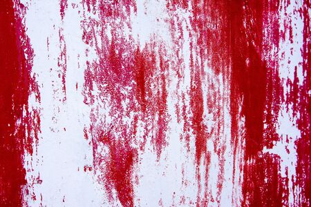 Red scratch concrete wall texture backgroundの写真素材