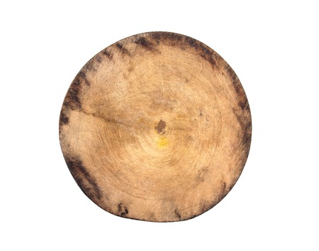 Old round cutting board isolated on white backgroundの写真素材