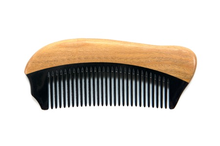 Brown and black color comb isolated on white backgroundの写真素材