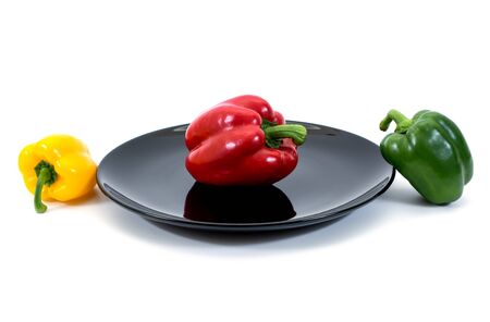 paprika in a plate over whiteの写真素材