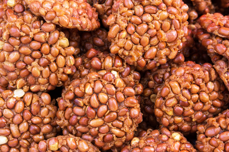 Peanut Crackers Made By Peanut or Groundnut on Cutting Board, Thai Snack of Dietary Fiber.Peanut crackers backgroundの写真素材