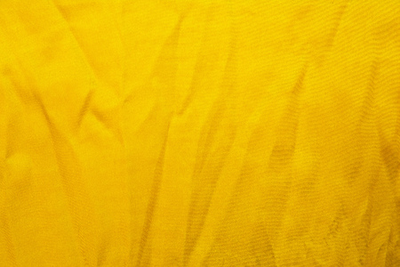 Gold thread fabric.Gold fabric.Yellow gold fabric.Gold fabric textureの写真素材