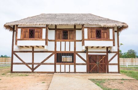 Old barn on country road.Old wooden barnの写真素材