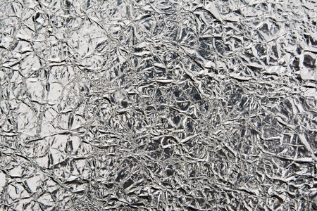 silver rough wrinkle foil texture.Silver foil texture background.silver textureの写真素材