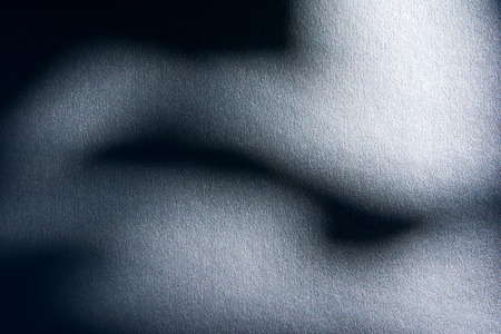 Silver textured under the shade with blue gradient.Silver texture with shadow texture background.Dark silver textureの写真素材