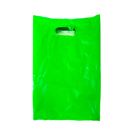 Old green plastic shopping bag with handle isolated oh white backgroundの写真素材