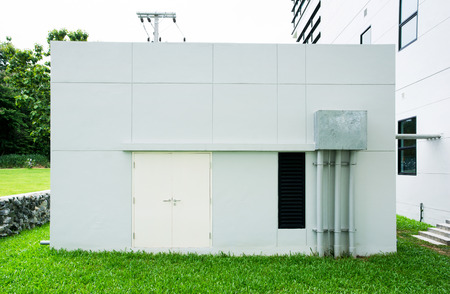 Generator room outdoor at the back of building background.Electric high voltage roomの写真素材