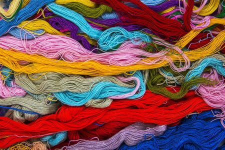 Colorful threads messy texture background. Mixed colorful thread tangle texture