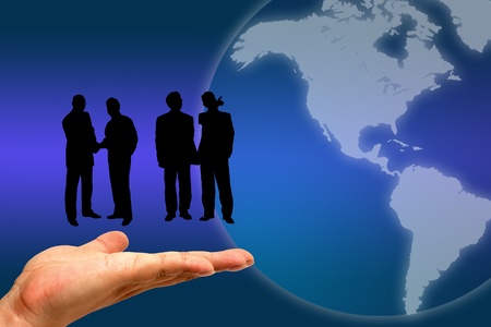 Silhouettes of people on handの写真素材