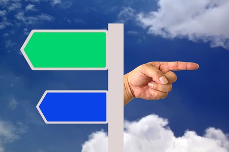 Direction traffic sign with handの写真素材