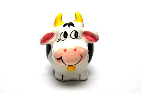 Cow coin box on white backgroundの写真素材