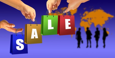 Shopping bag in hand on world and women backgroundの写真素材