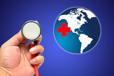 Stethoscope on a world background ,Save the worldの写真素材