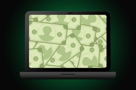 Laptop computer with moneyの写真素材