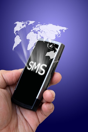 Mobile phone in the hand with messagesの写真素材