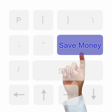 Save money button on keyboard with finger pushing a buttonの写真素材