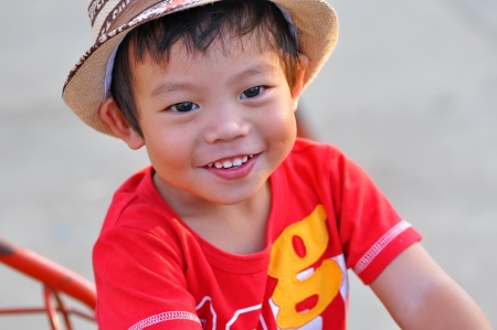 Three years old boy in capの写真素材