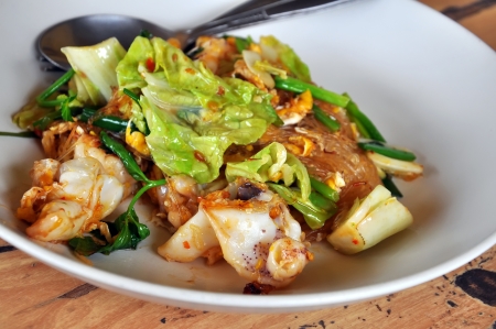 Stir-fried seafood vermicelli with spoon and fork.  Sukiyaki in Thai styleの写真素材