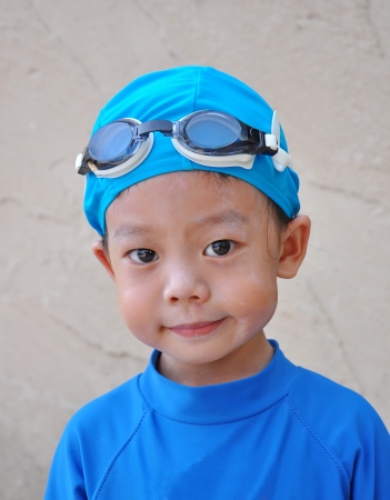 Portrait of a Three years old boy with swimming accessoriesの写真素材