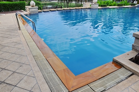 part of swimming pool with blue waterのeditorial素材
