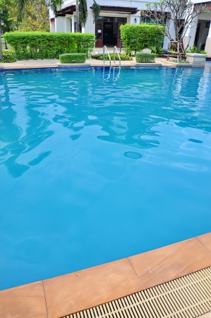 part of swimming pool with blue waterのeditorial素材