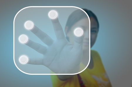 Portrait of asia woman pressing the buttonの写真素材