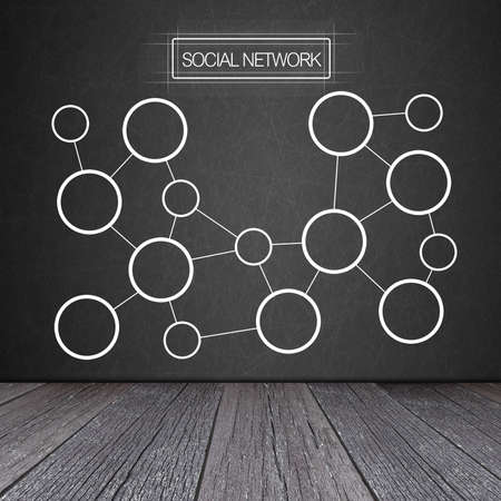 Social network concept on the Blackboard with ground of the woodの写真素材