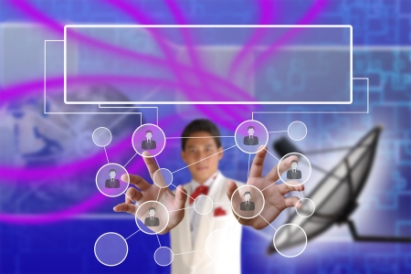 Businessman pushing people Social Network on the Satellite dish transmission data backgroundの写真素材