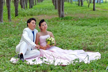 A portrait of the beautiful Couple in wedding dressの写真素材