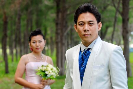 A portrait of the beautiful Couple in wedding dressの写真素材