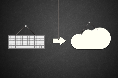 Keyboard with Cloud and white arrow on the Blackboard backgroundの写真素材