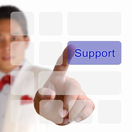 Support button on keyboard with finger pushing a buttonの写真素材