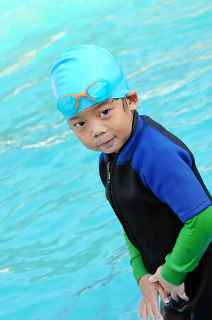 Portrait of four years old boy with swimming accessoriesの写真素材