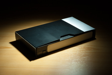 Secret videotape in dark Snoot modifier on studio strobe.