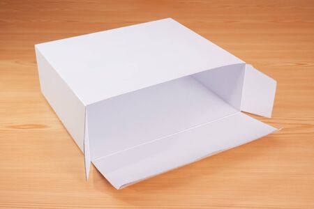 Open blank white box mock up on wood background.の写真素材