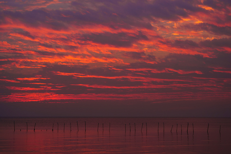 Colorful dramatic sky with cloud at sunsetの写真素材