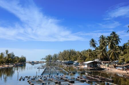 Narathiwat, Thailand - October 27, 2006: Local riverside fishery on the canal connect to the seaのeditorial素材